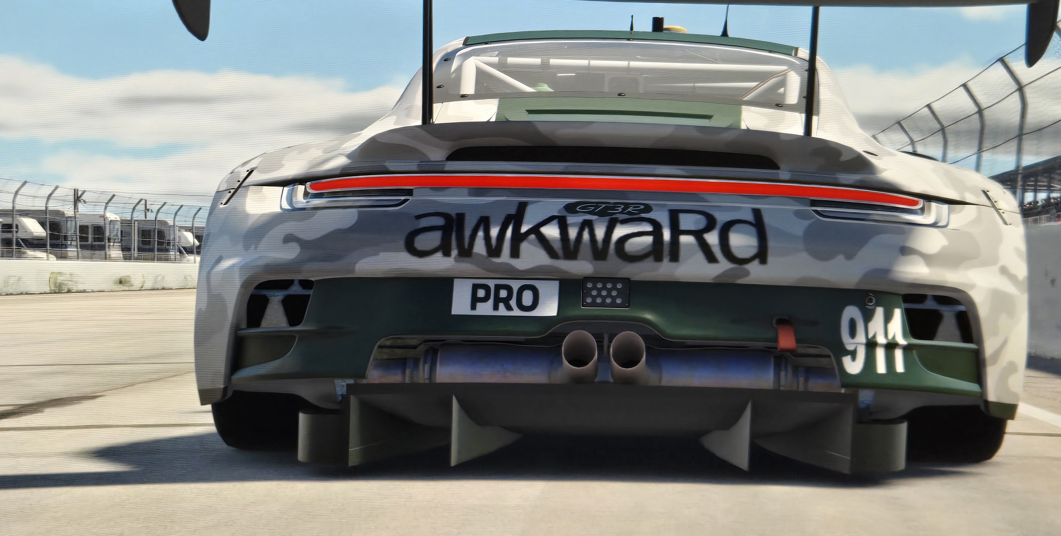 Rear view of the Vulgoose Racing Porsche 992 GT3 R, camo livery, car number 911